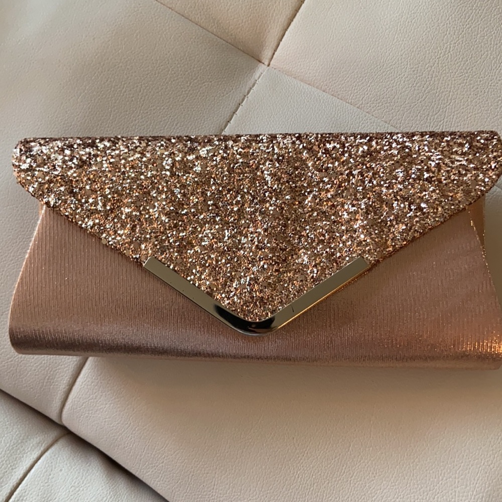 Pink glitter clutch bag